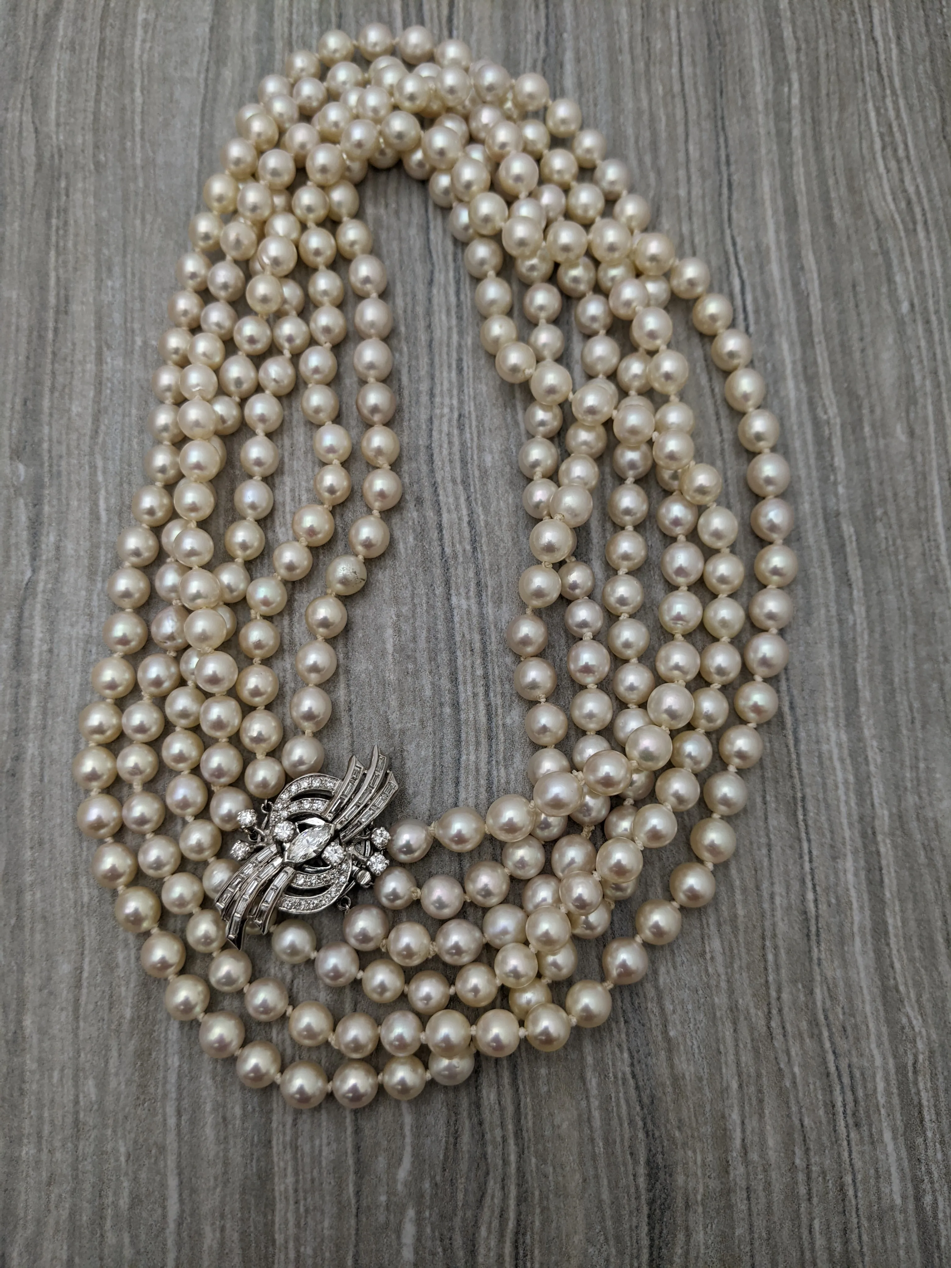 30" three-strand cultured pearl necklace with white gold and diamond clasp