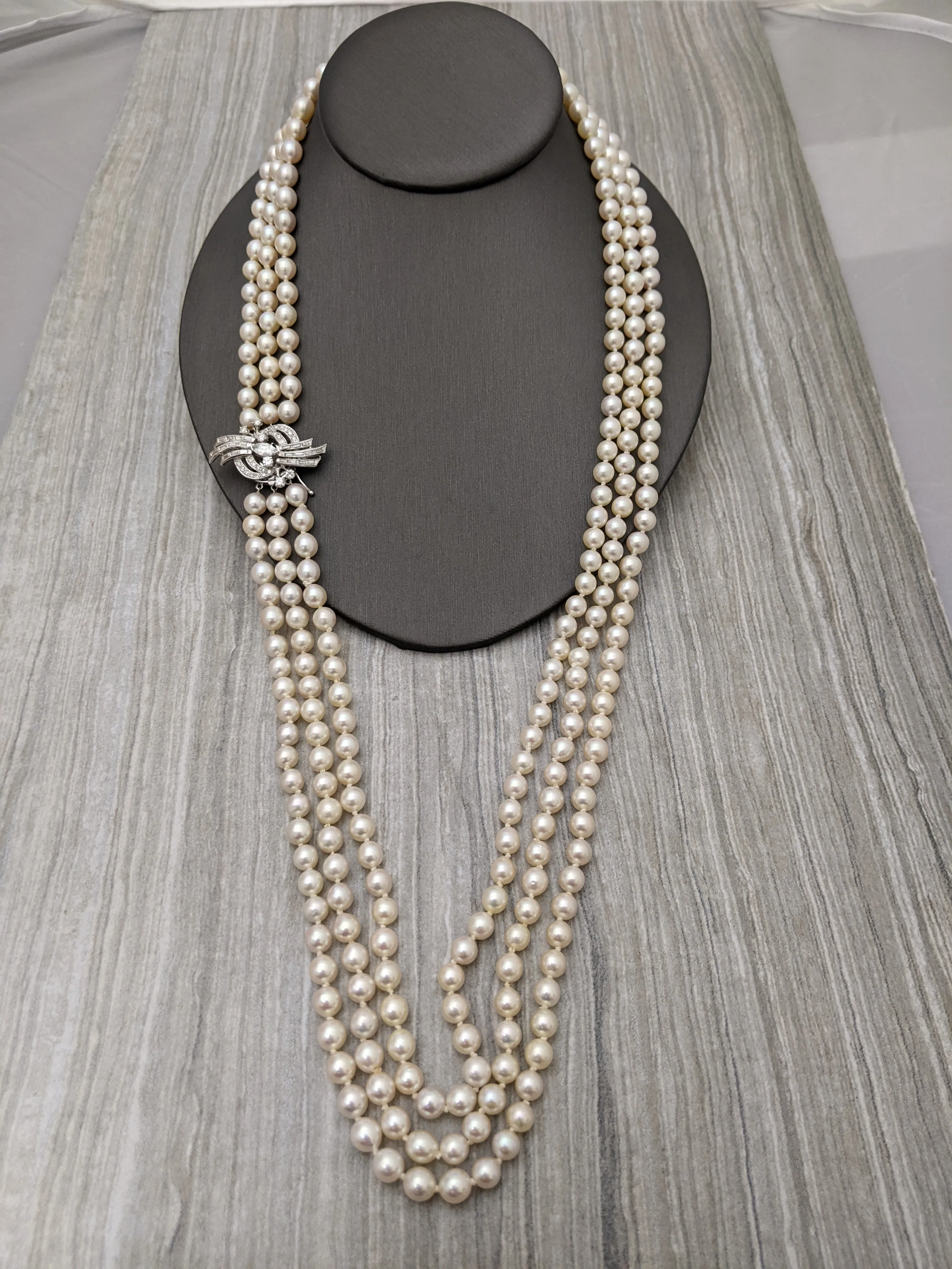 30" three-strand cultured pearl necklace with white gold and diamond clasp