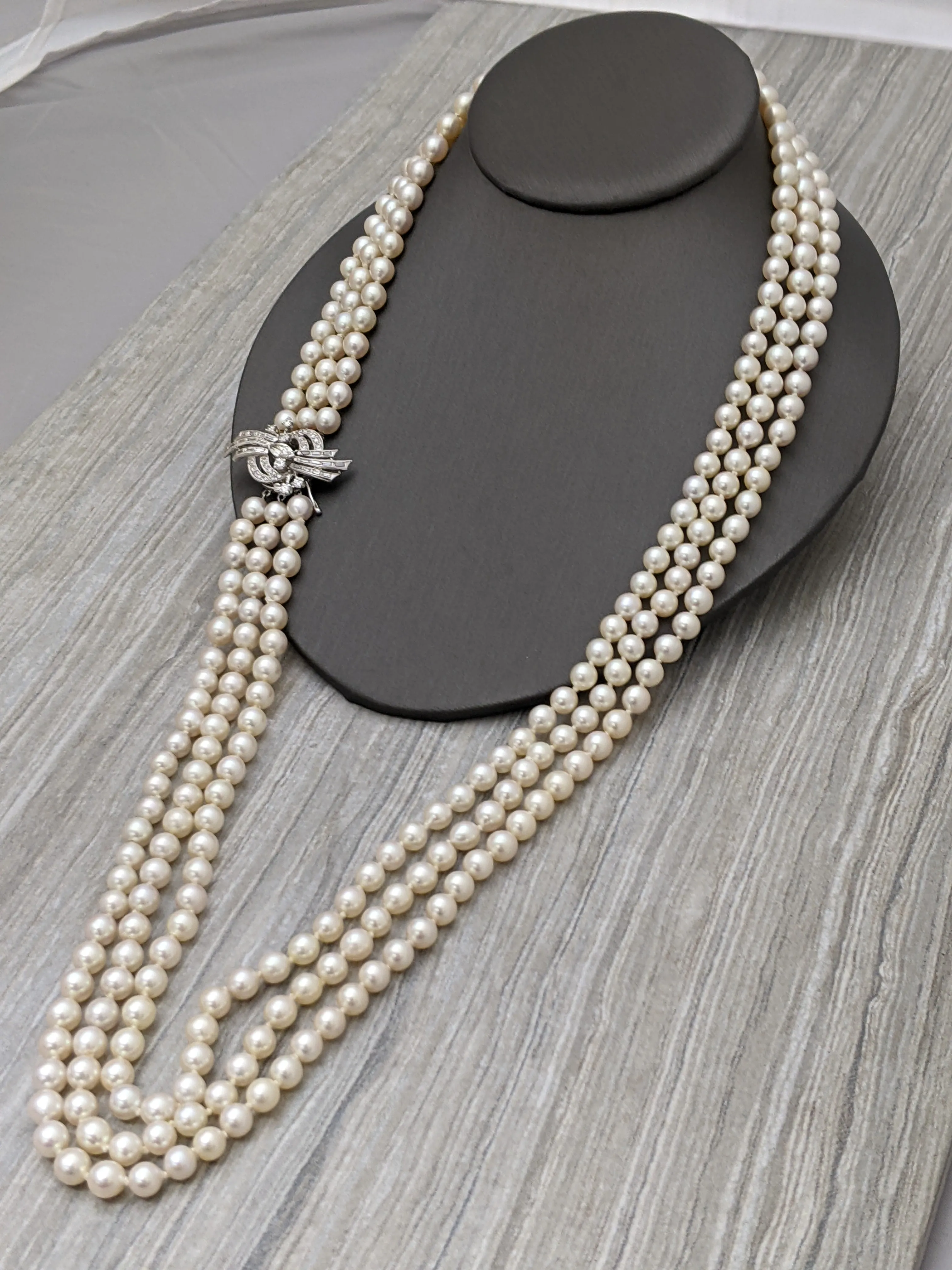 30" three-strand cultured pearl necklace with white gold and diamond clasp